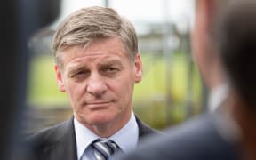 Bill English at a social housing announcement in Northcote