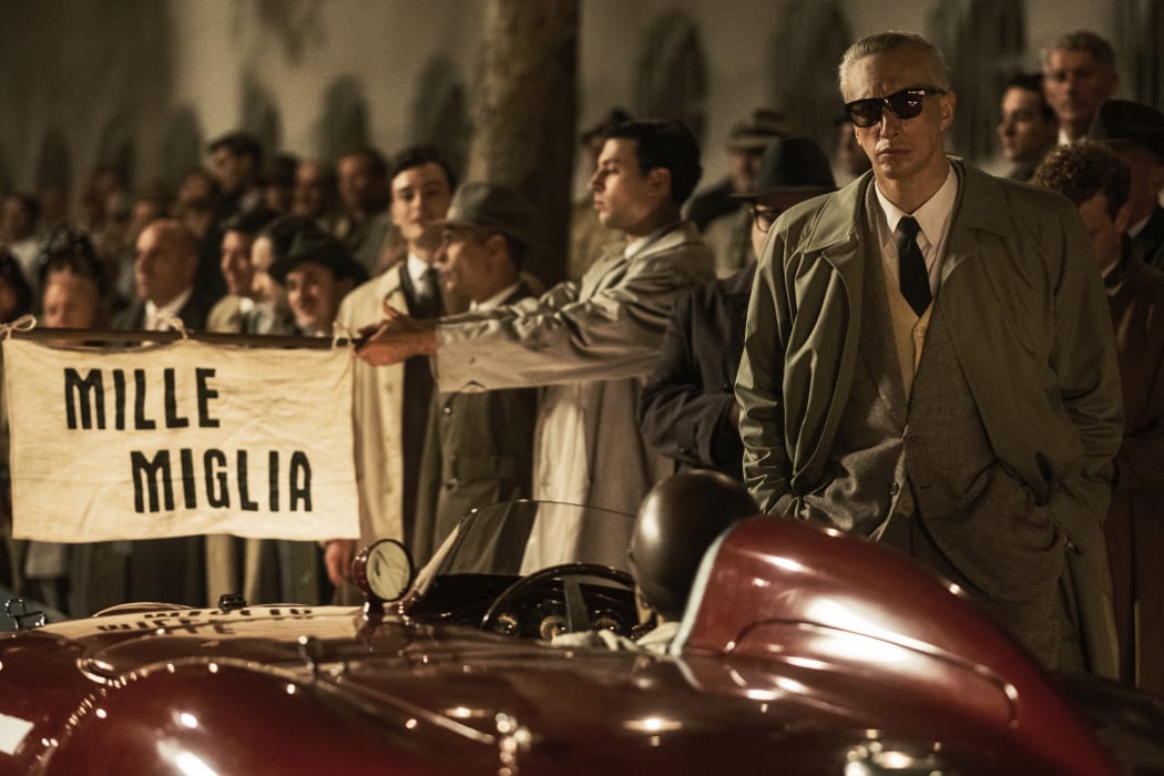 Still from the 2023 Michael Mann biopic Ferrari featuring Adam Driver as Enzo Ferrari.