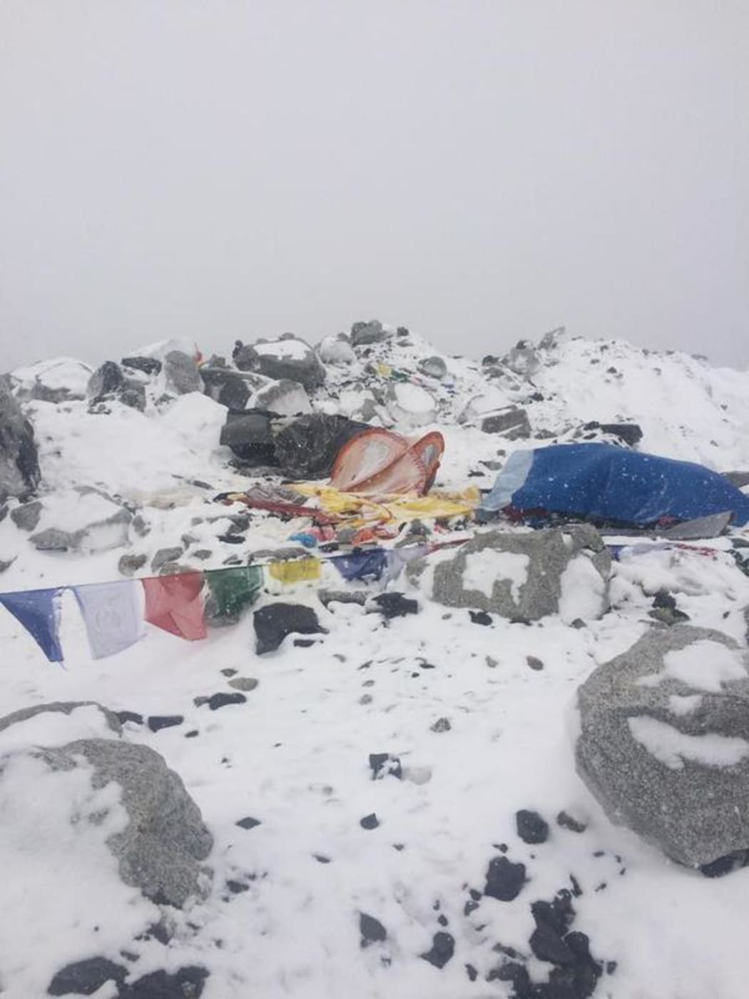 An image posted on Twitter claims to show tents at Everest's Base Camp covered with snow after the earthquake.