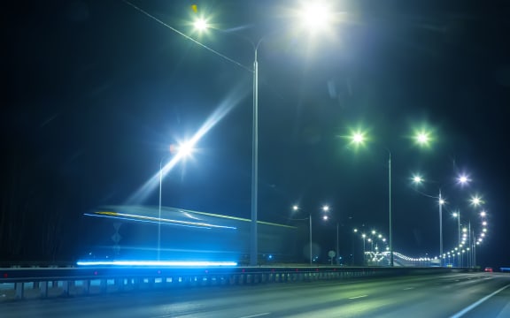 92567847 - winter highway at night shined with lamps