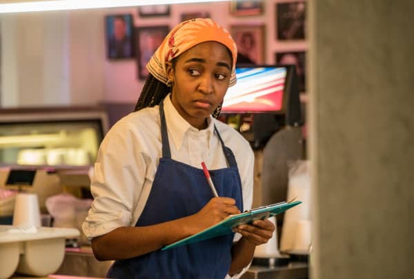 Ayo Edebiri as Sydney Adamu in The Bear.