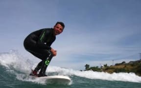Darren Mills was a keen surfer before the shark attack.