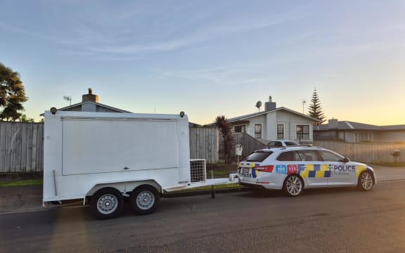 Police outside the Alexander Avenue home where a teenage boy was killed early on Sunday morning.