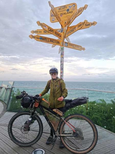 Mahe Braaksma, 14, pauses for a photo with his bike at Cape Reinga.