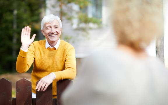 Neighbours waving hello.