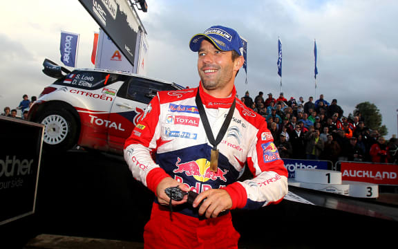 Sebastien Loeb all smiles after winning 2012 Rally New Zealand.