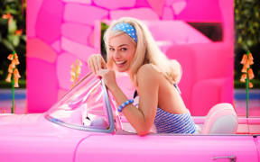 Margot Robbie as Barbie