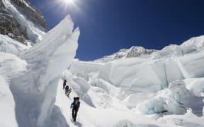 Climbers in the Khumbu icefall, Mt Everest, in 2012.