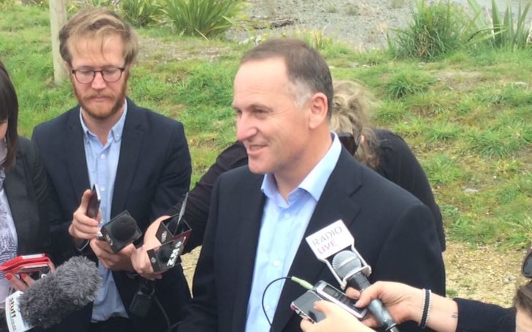 John Key talks to the media on the penultimate day of the election campaign.