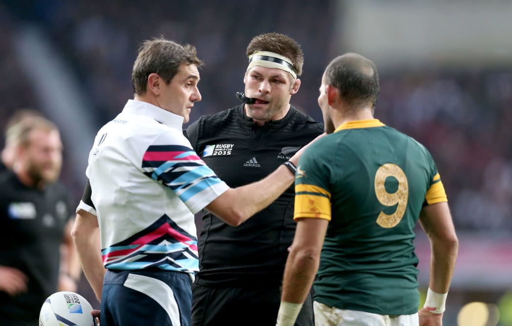 French referee Jerome Garces with Richie McCaw and Fourie du Preez RWC2015