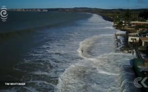 Waves lap at Hawke's Bay homes after coastline disappears