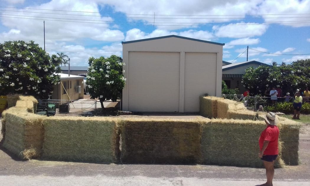The croc was eventually boxed in with hay bales and contained until wildlife experts from Cairns arrived to relocate him.