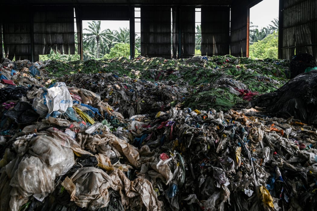 Plastic waste at an abandoned factory outside Kuala Lumpur.