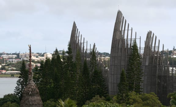 New Caledonia's Jean-Marie Tjibaou Cultural Centre meets the outer Noumea skyline.
