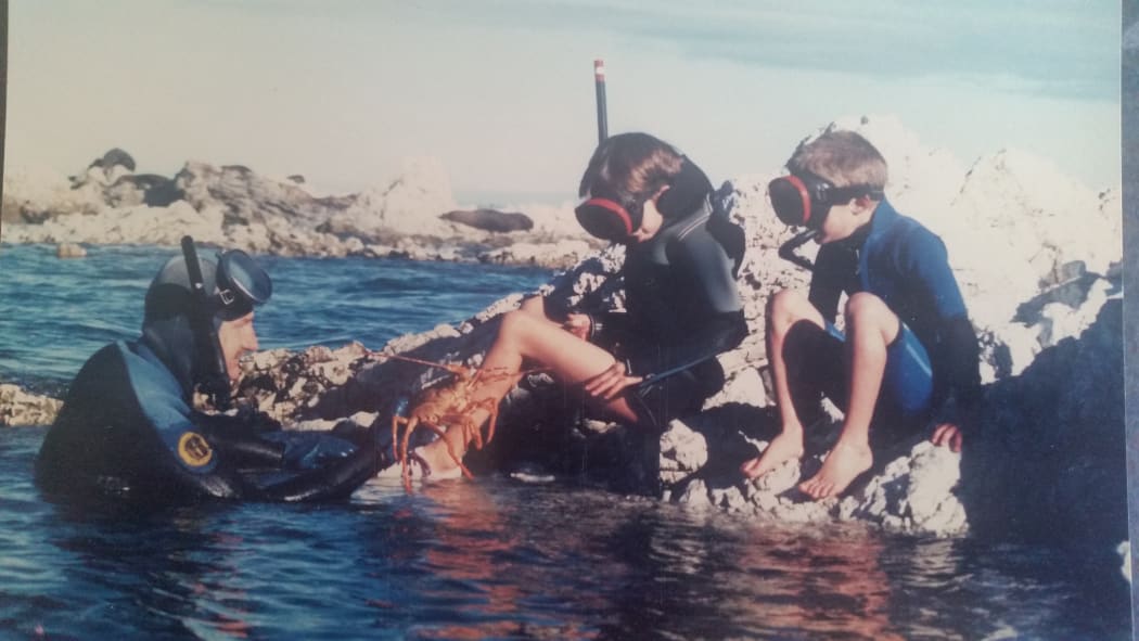Graeme Chambers diving with his children Vanessa and Jonni Chambers.
