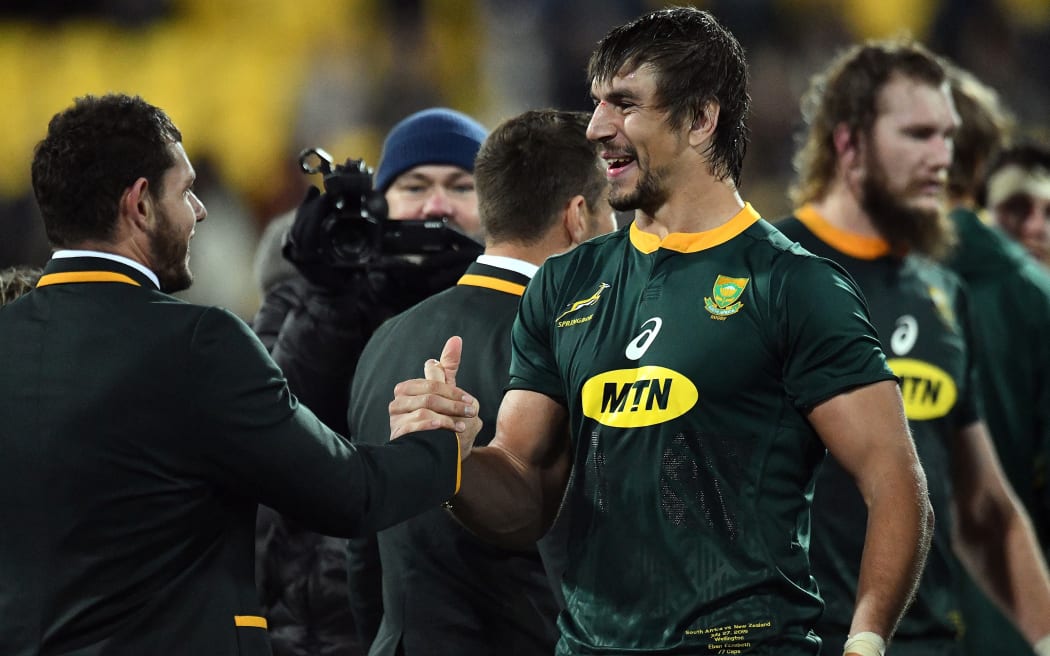 The Springboks celebrate their draw against the All Blacks.