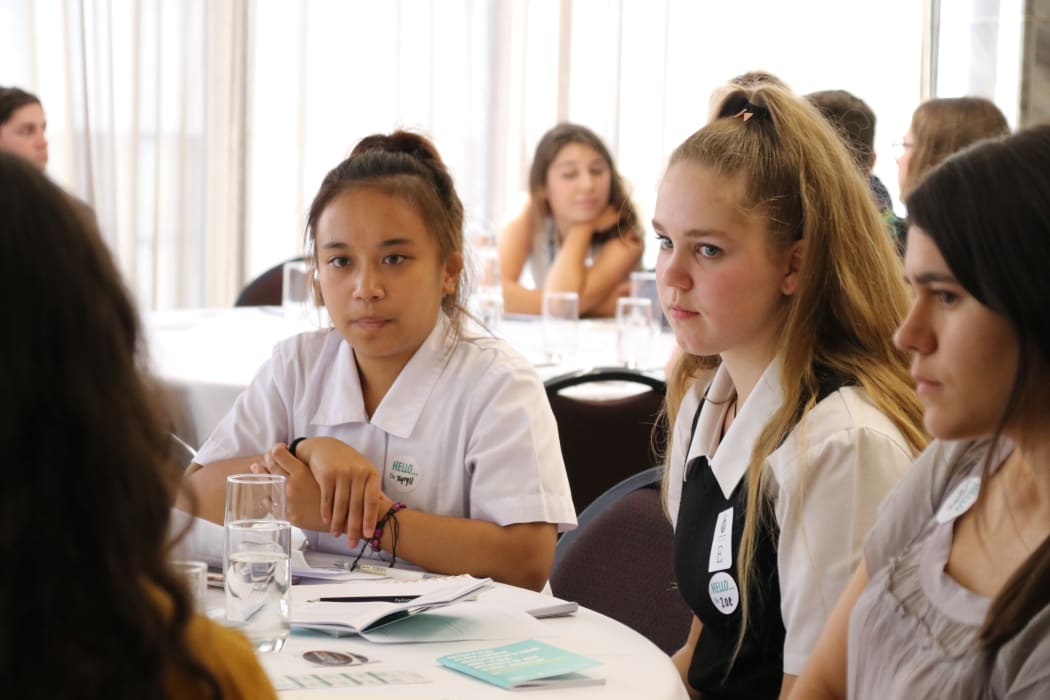 Xyryll Gayagoy, 17 and Zoe Williams-Verahey, 16 attend a workshop on how to make submissions on bills