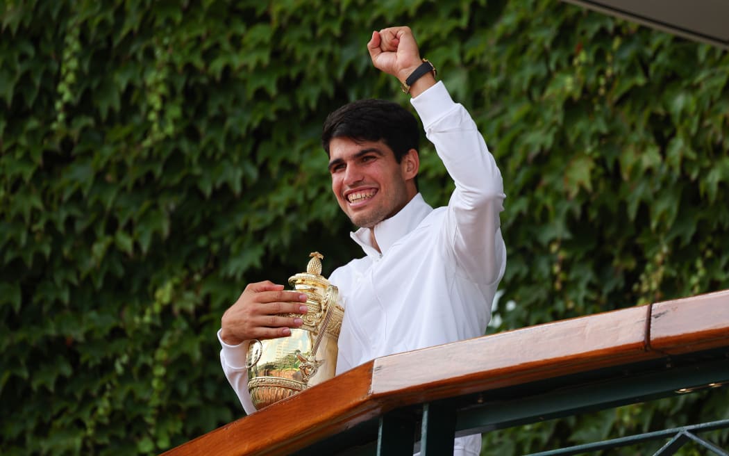 Carlos Alcaraz after winning Wimbledon in 2024.