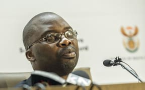 Justice Minister Michael Masutha speaks to reporters about South Africa's planned withdrawal from the International Criminal Court.