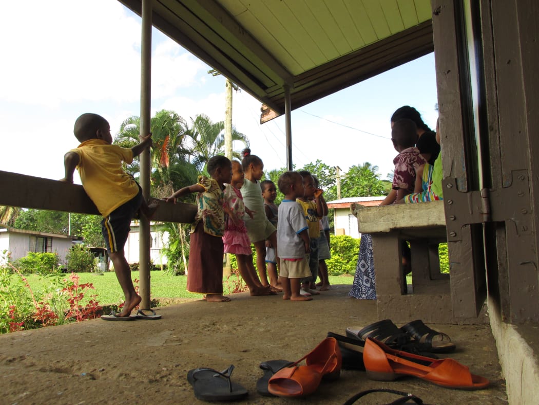 Mary Tiumalu working with children in Fiji.
