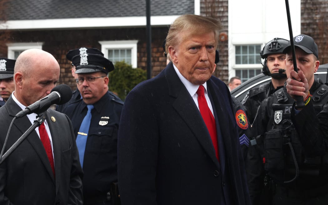 Former U.S. President Donald Trump speaks to the media after attending the wake of slain NYPD Officer Jonathan Diller at the Massapequa Funeral Home on 28 March, 2024 in Massapequa, New York.