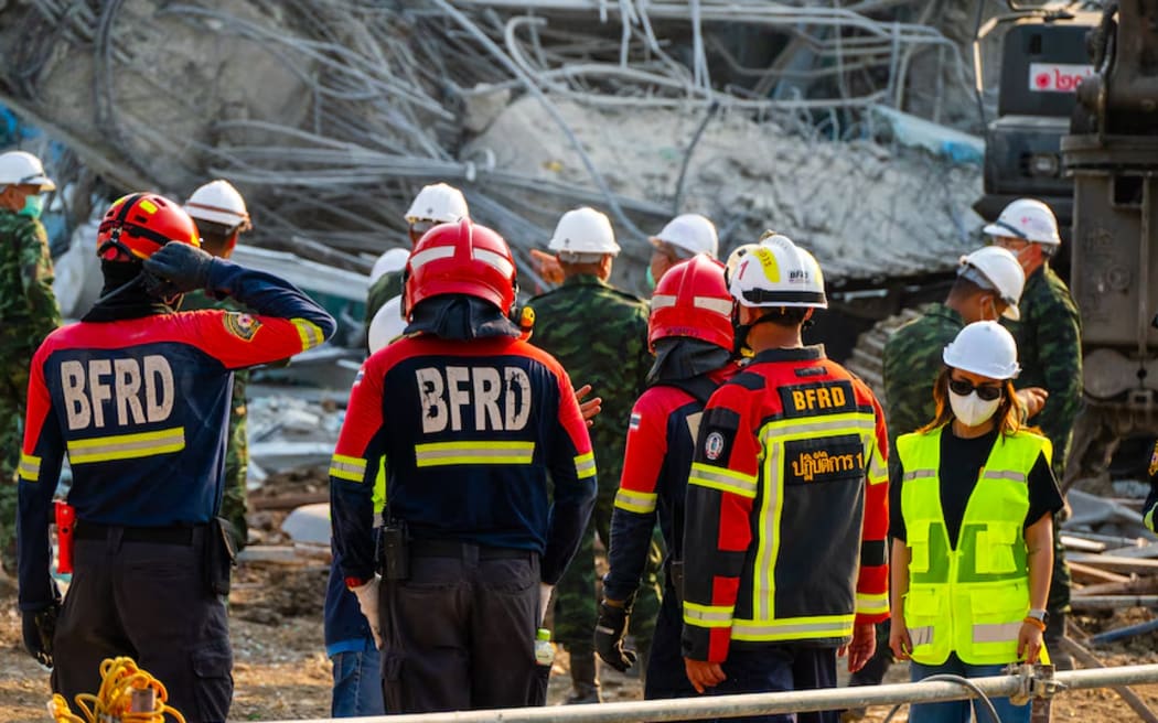 Rescuers are pumping air into the collapsed building in the hope of helping anyone alive and trapped inside.