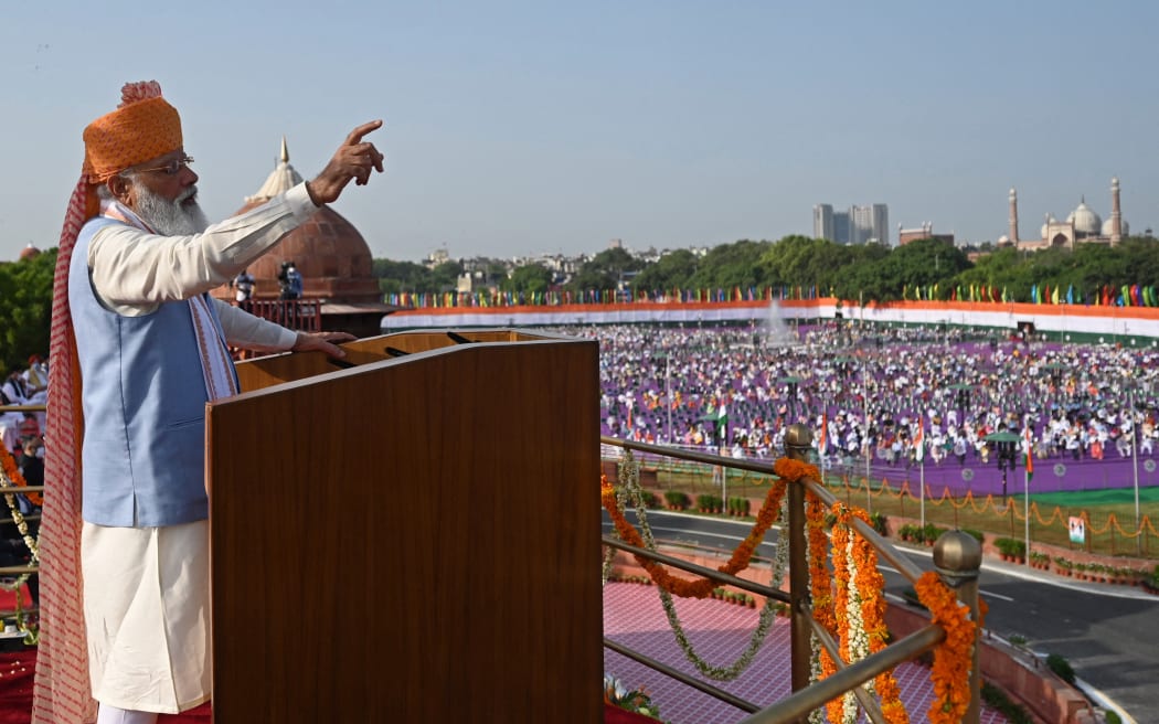 Indian Prime Minister Narendra Modi addresses the nation from the ramparts of the Red Fort during the celebrations to mark Indias 75th Independence Day in New Delhi on August 15, 2021.