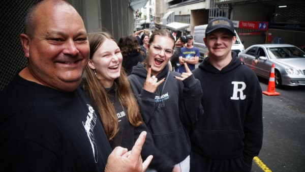 Metallica fans queue to buy merchandise in central Auckland before the band's gig at Eden Park.