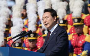 South Korea's President Yoon Suk-yeol delivers a speech during a ceremony marking the 74th anniversary of Armed Forces Day at the Military Base in Gyeryong city on October 1, 2022. (Photo by YONHAP / YONHAP / AFP) / - South Korea OUT / REPUBLIC OF KOREA OUT  NO ARCHIVES  RESTRICTED TO SUBSCRIPTION USE