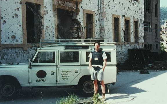 Tony Gardner in front of the team's Land Rover nicknamed "The Beast"