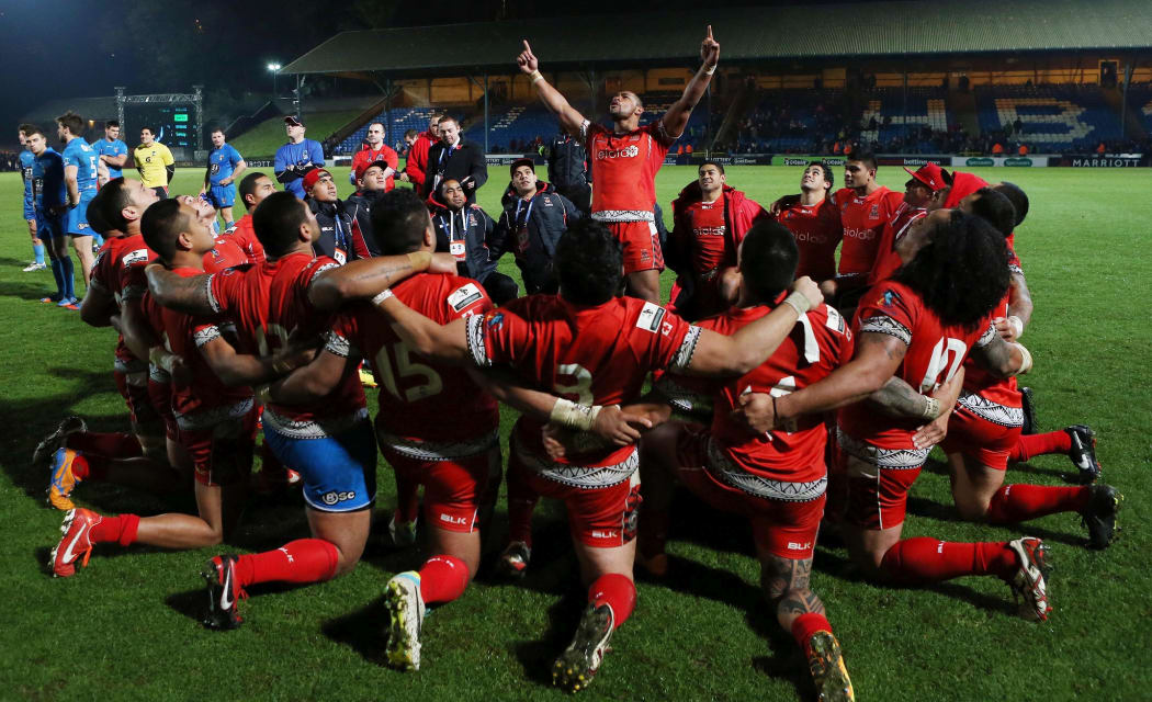 Tonga perform their haka after playing Italy at the 2013 World Cup in England.