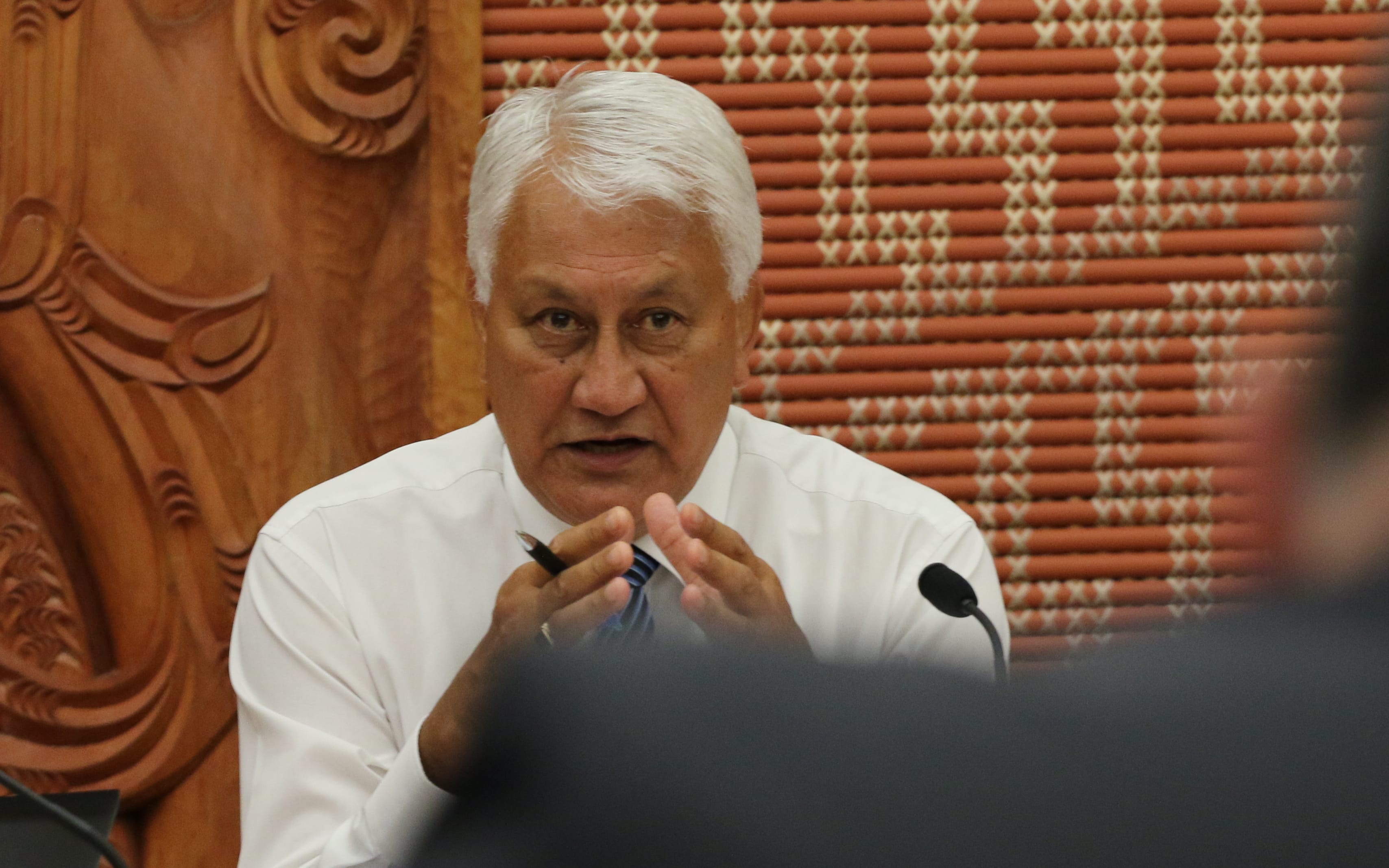 Chair of the Maori Affairs Committee Tutehounuku (Nuk) Korako listens to a coroner about practices surrounding whanau access to tupapaku (deceased).