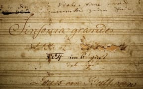 Title page from the Eroica Symphony manuscript showing Beethoven's removal of the dedication to Napoleon.