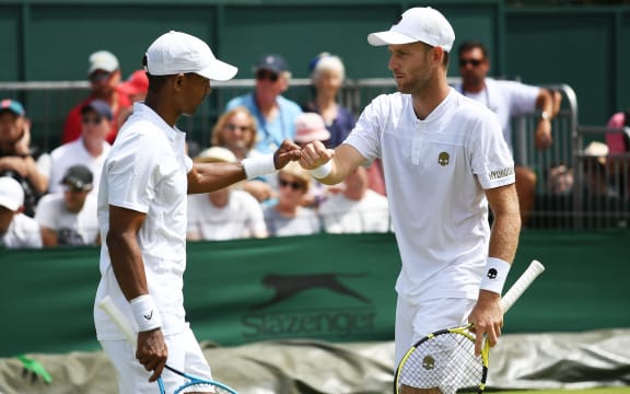 New Zealand's Michael Venus (R) and South African doubles partner Raven Klaasen during the Wimbledon Tennis Championships.
