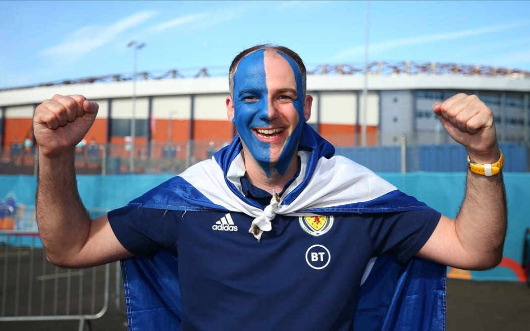 A Scotland fan with his face painted for the occasion