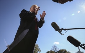 President Donald Trump talks to members of the media on the South Lawn of the White House as he arrives to the White House after a trip to New York on November 3, 2019 in Washington, DC.
(Photo by Oliver Contreras/SIPA USA) | usage worldwide