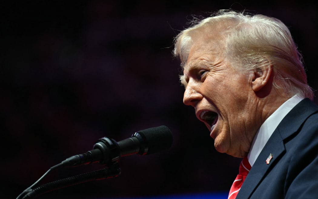 US President-elect Donald Trump speaks at a MAGA victory rally at Capital One Arena in Washington, DC on January 19, 2025, one day ahead of his inauguration ceremony. (Photo by Jim WATSON / AFP)