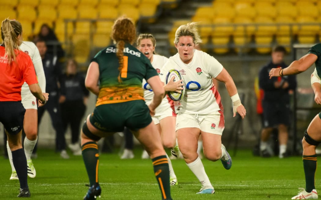 Marlie Packer of England makes a run against Australia.