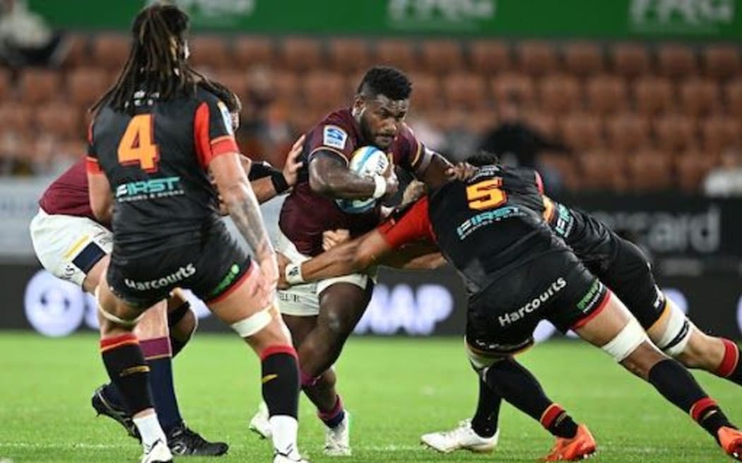 Timoci Tavatavanawai, of the Highlanders, takes on the Chiefs' defence in their Super Rugby Pacific match in Hamilton on 19 April 2025. Photo/Jeremy Ward/Photosport