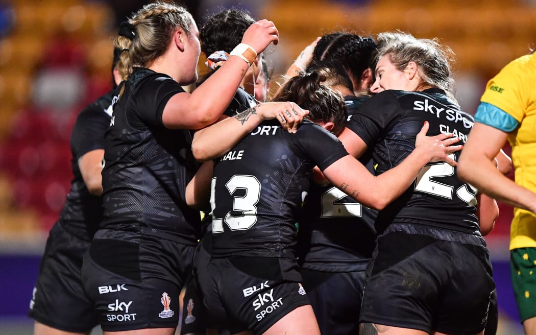 The Kiwi Ferns celebrate the try of fullback Apii Nicholls against Australia in group play at the women's Rugby League World Cup.