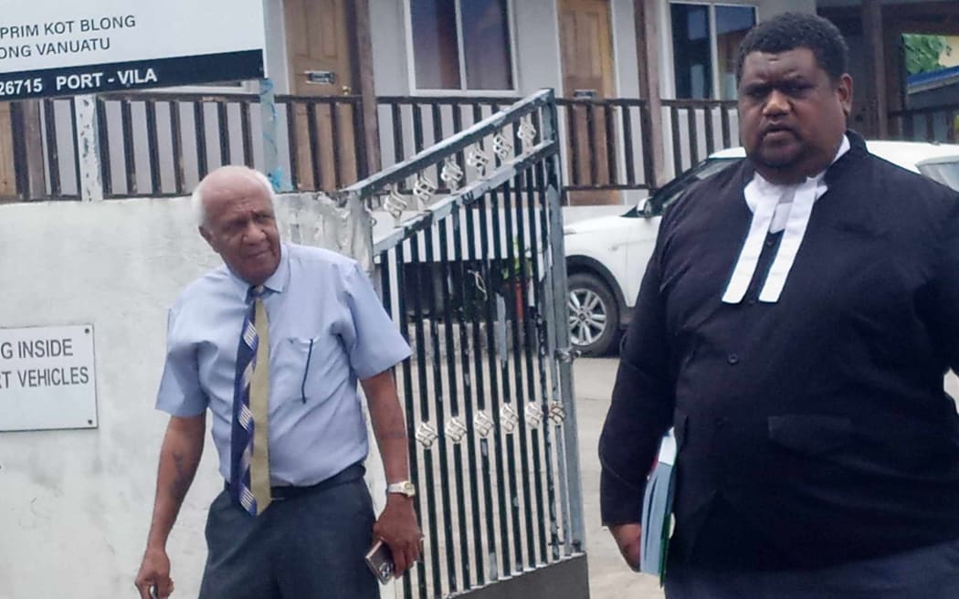 Sato Kilman, left, outside the Supreme Court in Vanuatu on Friday. 13 October 2023.