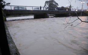 A view of Nelson's flooded Maitai River from the Trafalgar Street bridge on 18 August, 2022.