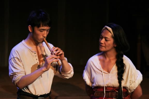 Yosan An as Yee plays flute for Elsie (Awhina-Rose Henare Ashby)