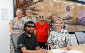 Whakatāne Accessible and Inclusive Trust member Grant Chase and Whakatāne District Council chief executive Steph O’Sullivan sign the Memorandum of Understanding with Ruth Gerzon, Mayor Victor Luca, Nancy Walker and the council’s senior community development advisor Karen Summerhays in attendance.