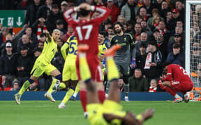 Tottenham Hotspur's Brazilian striker Richarlison (far L) celebrates after scoring against Liverpool, 2026.