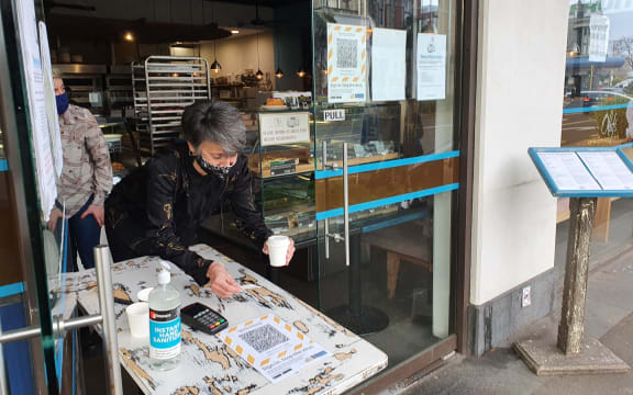 Oranna, one of the owners of Olafs Cafe in Mount Eden, isoverjoyed at being able to see customers again under level 3.