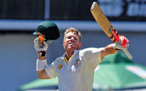 David Warner of Australia celebrates after scoring a century.