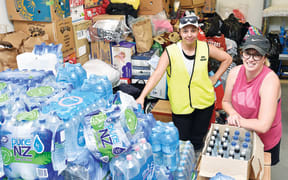 Waikohu Civil Defence public information manager Nicky-Marie Kohere-Smiler with Charity Rutene at Te Karaka Area School. Goods have been donated from as far afield as Northland and Taranaki.