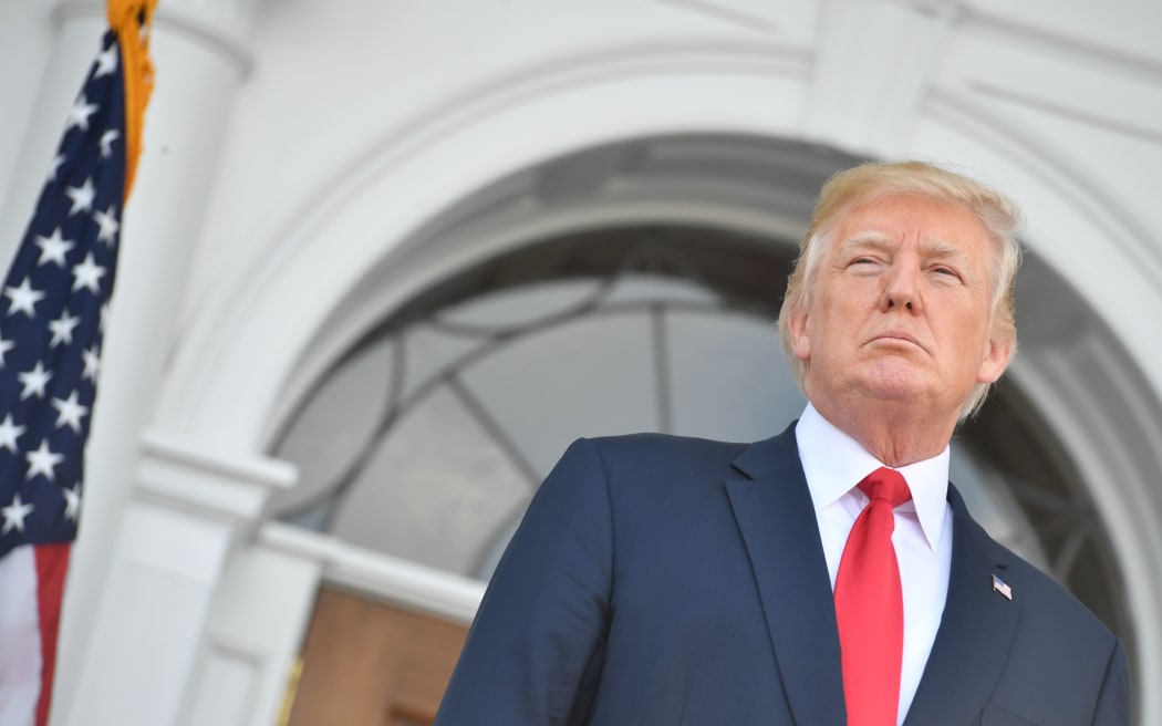 US President Donald Trump speaks to reporters about North Korea outside his Bedminster National Golf Club in New Jersey.