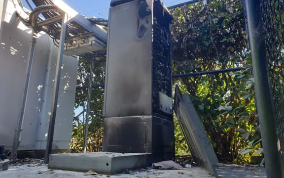 A burnt 5G cellphone tower.